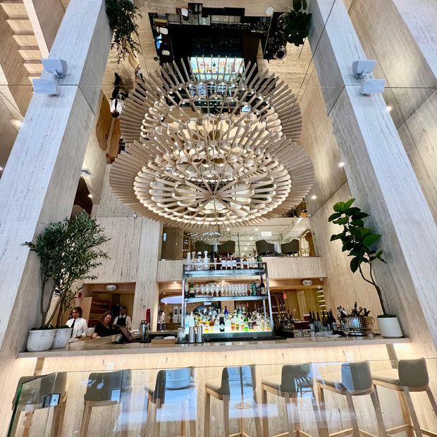 Ceiling tiles mounted in a spacious New York City restaurant, Bucatini