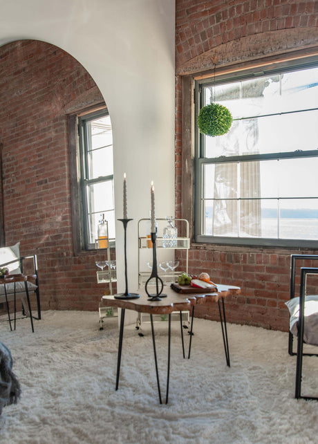Arched, full-length mirror in a mid-century modern living room