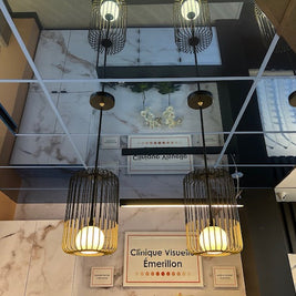 Ceiling tile mirrors in a display design booth 
