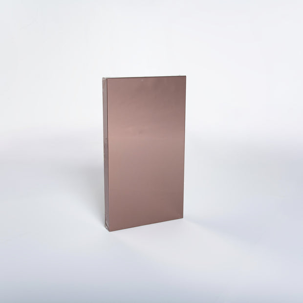 Rectangular bronze mirror sample on a white background