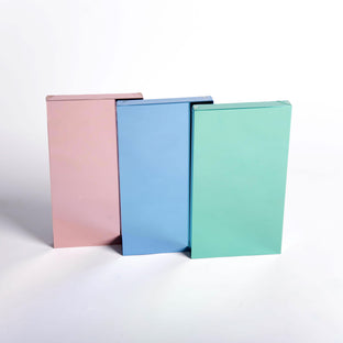 Rose, teal and blue film mirror color samples on white background