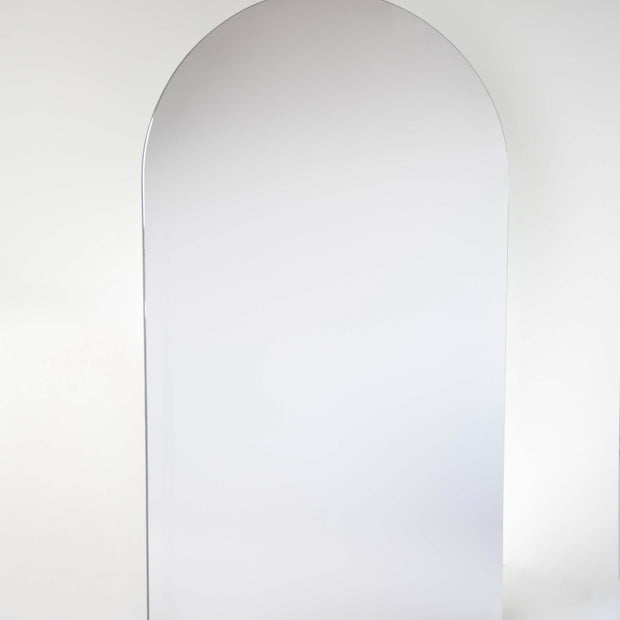 Arched mirror on a white background