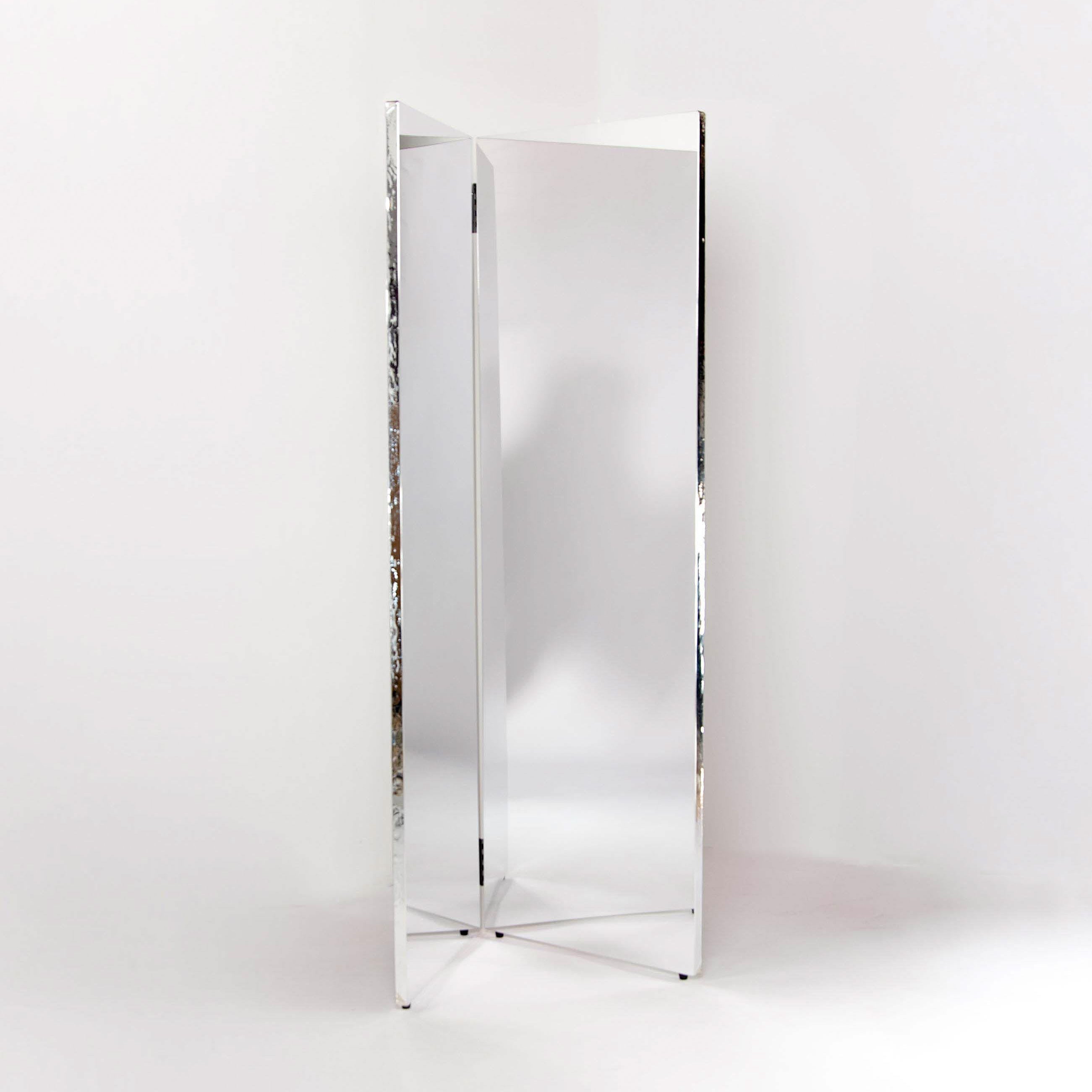 Tall, rectangular bifold mirror on a white background