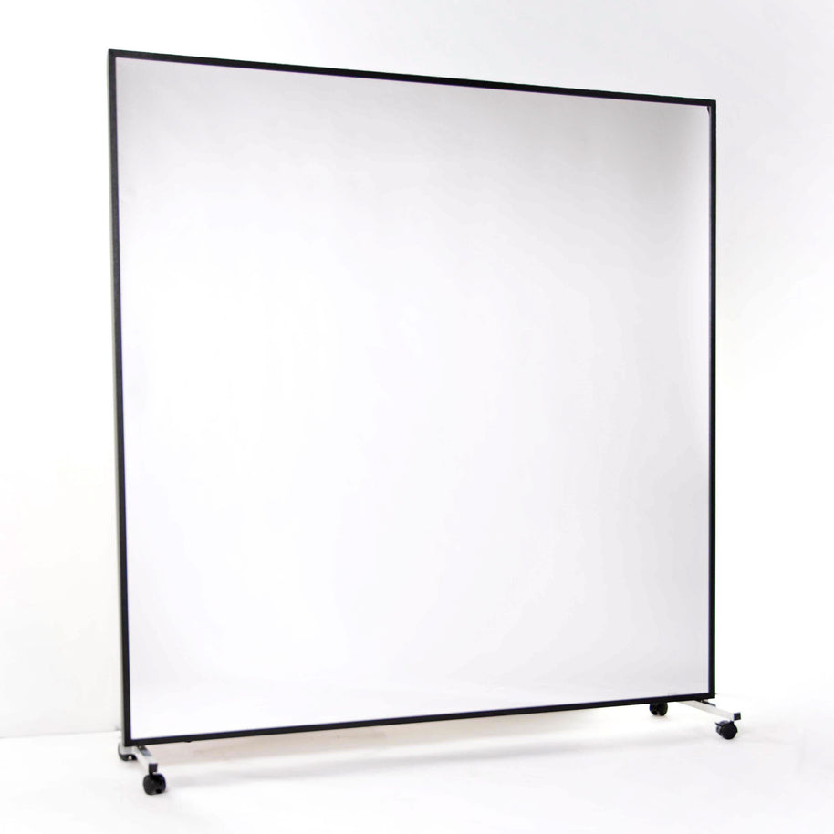 Portable mirror with whiteboard backing on wheels with black frame against a white background