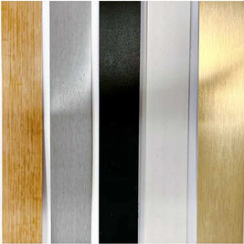 Various metal edging finishes including wood, silver, black, white and gold on a white background
