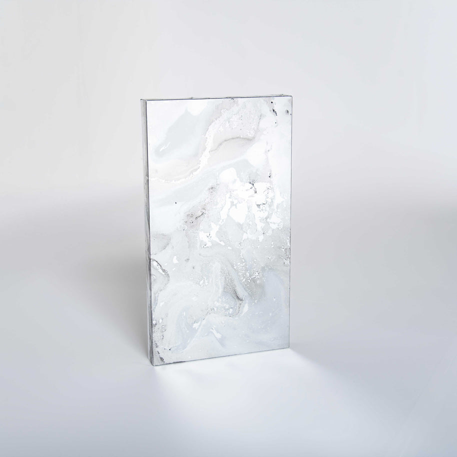 Rectangular LiteMirror with a marble-like, silver antique patina on a white background