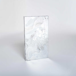 Rectangular LiteMirror with a marble-like, silver antique patina on a white background